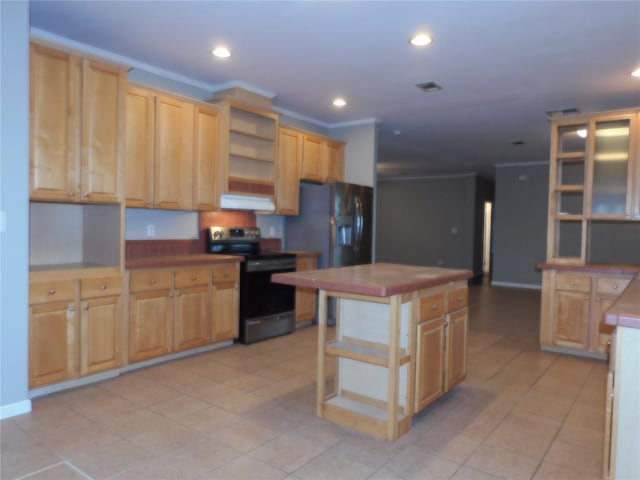 kitchen featuring ornamental molding, light brown cabinets, stainless steel appliances, and a kitchen island