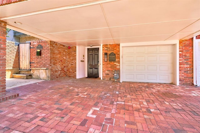 view of patio featuring a garage