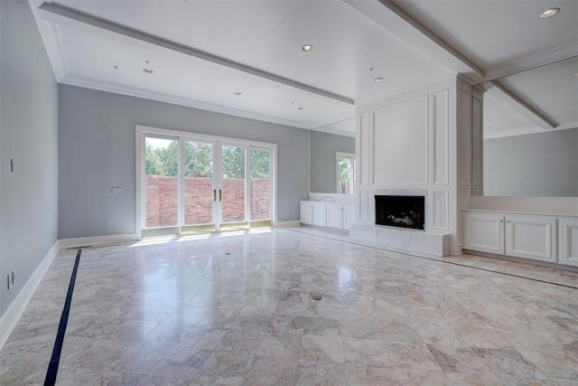 unfurnished living room with french doors and ornamental molding