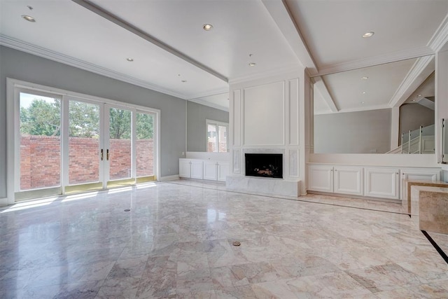 unfurnished living room with a fireplace, french doors, and ornamental molding