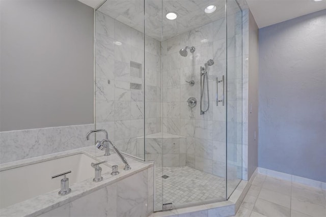 bathroom with independent shower and bath