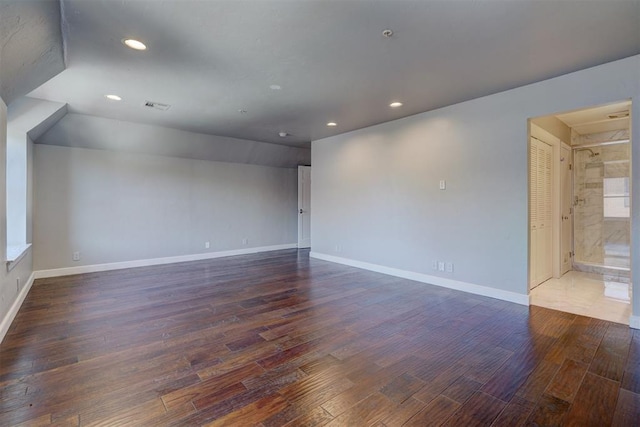 unfurnished room featuring dark hardwood / wood-style floors