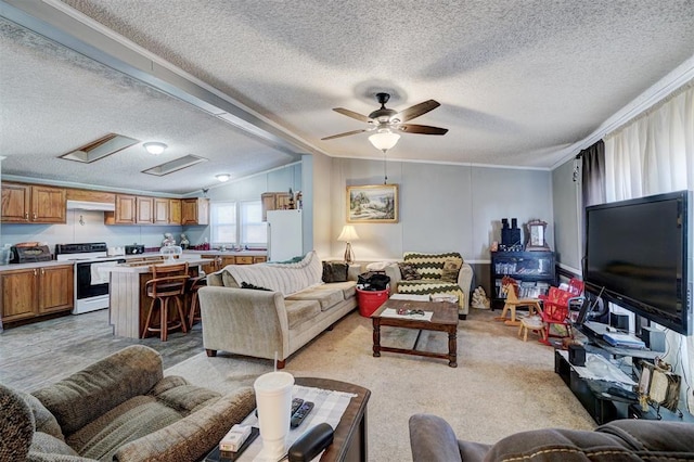 living room with ceiling fan, ornamental molding, lofted ceiling with beams, and a textured ceiling