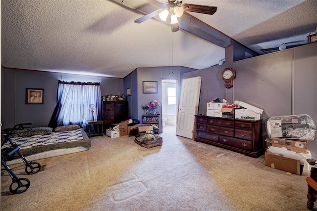 bedroom with carpet, a textured ceiling, and ceiling fan