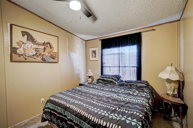 carpeted bedroom featuring crown molding, ceiling fan, and a textured ceiling