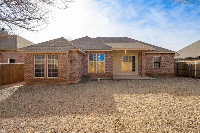 rear view of house with a patio area