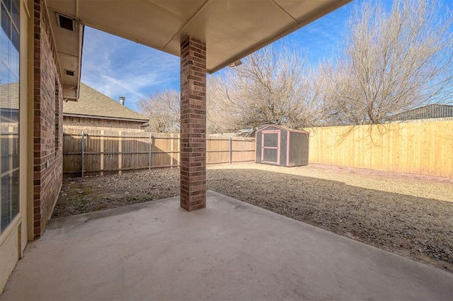 view of patio / terrace featuring a storage unit