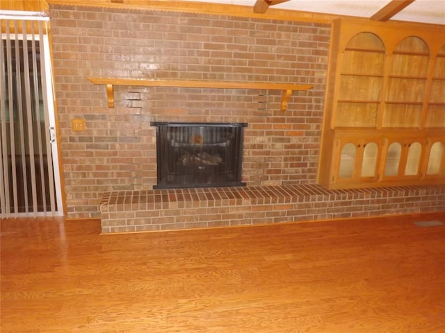 unfurnished living room with a fireplace