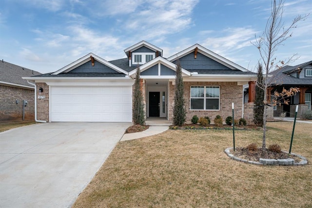 craftsman-style house with a garage and a front lawn