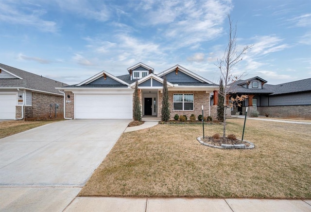 craftsman-style house featuring a garage and a front yard