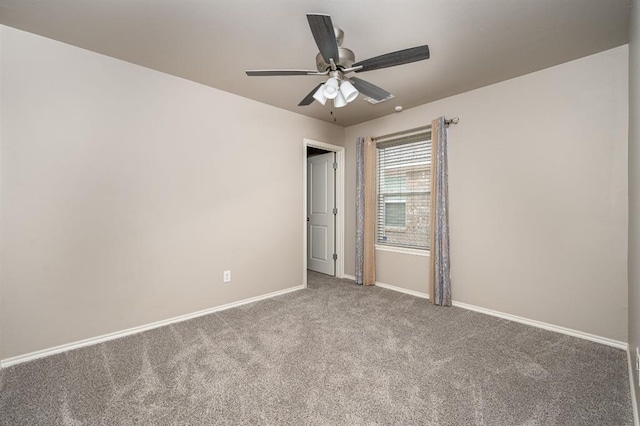 unfurnished bedroom with ceiling fan and carpet floors