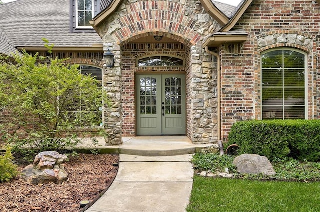 entrance to property featuring french doors