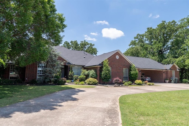 view of front of home with a front lawn