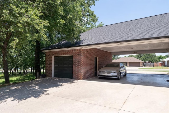 view of side of property with a carport