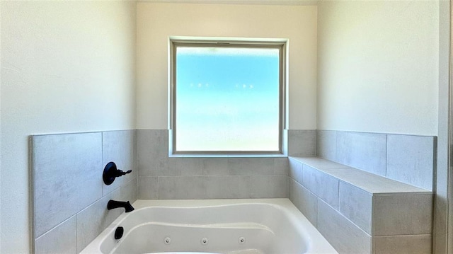 bathroom featuring a tub to relax in