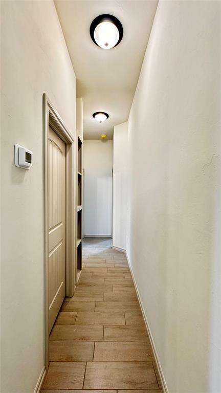 hallway featuring light hardwood / wood-style floors