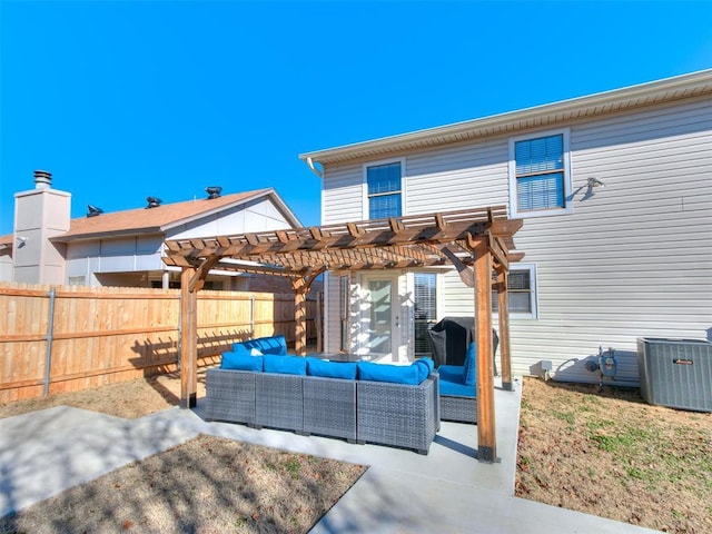 rear view of house with central air condition unit, a pergola, an outdoor hangout area, and a patio area