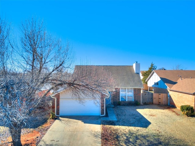 single story home featuring a garage