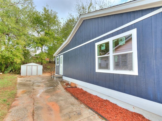 view of home's exterior featuring a storage shed