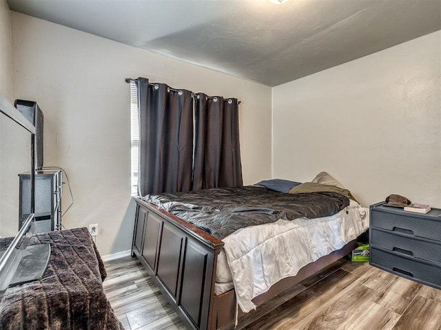 bedroom featuring light hardwood / wood-style floors