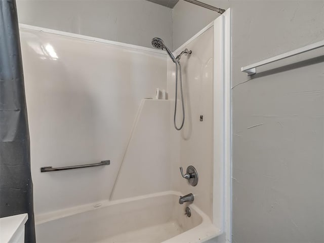 bathroom with shower / bath combination