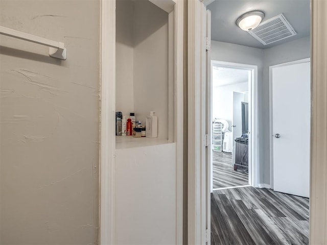 hall featuring dark hardwood / wood-style flooring