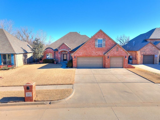 view of front of property with a garage