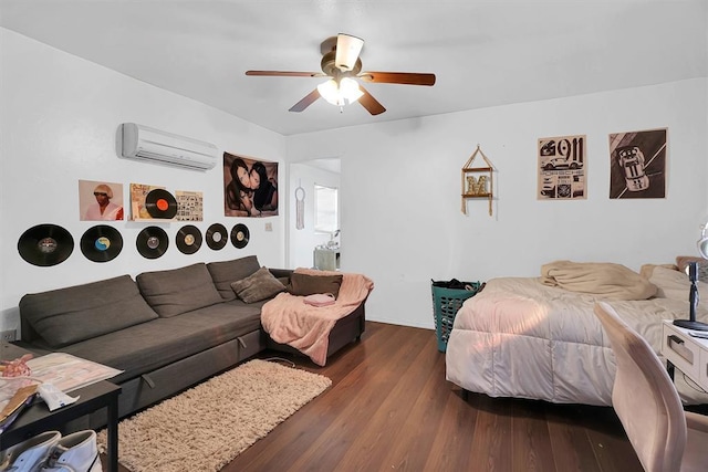 bedroom featuring ceiling fan, a wall mounted air conditioner, and dark hardwood / wood-style flooring