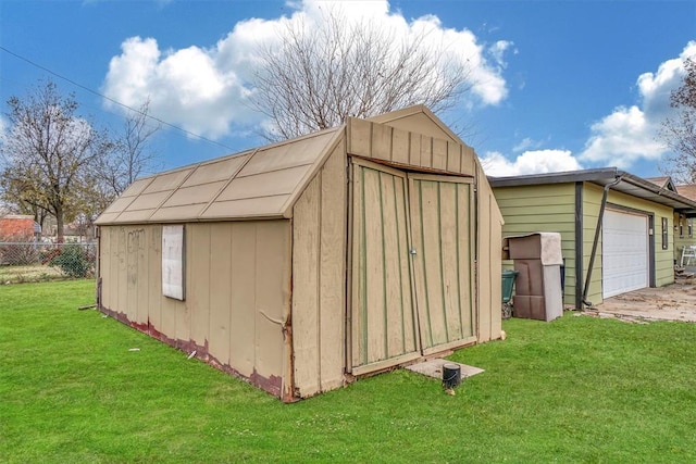 view of outdoor structure featuring a yard