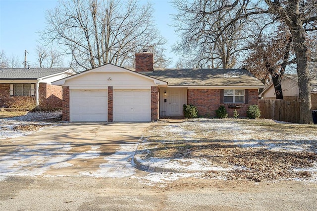 single story home with a garage