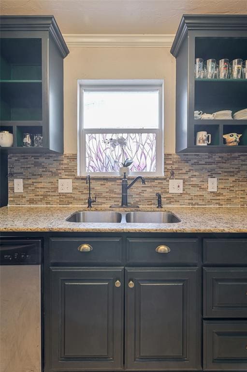 kitchen with sink, a wealth of natural light, dishwasher, and tasteful backsplash