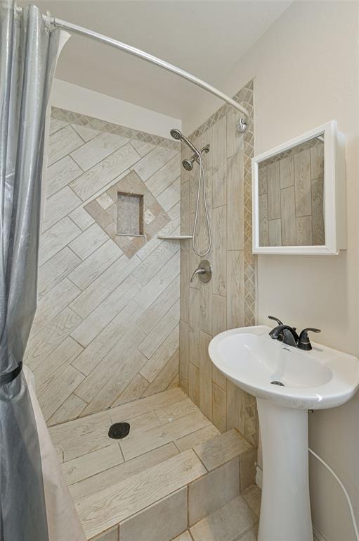 bathroom with walk in shower