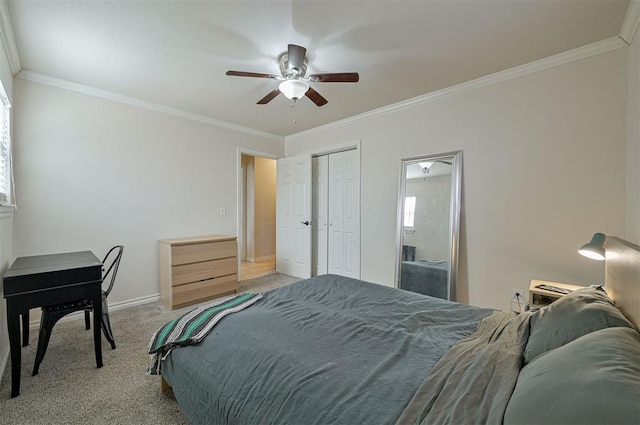 bedroom featuring ceiling fan, light colored carpet, and crown molding