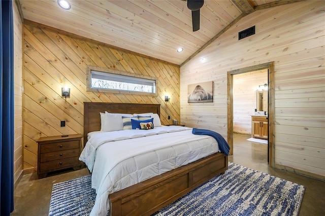 bedroom featuring lofted ceiling, wood walls, ensuite bath, and wood ceiling