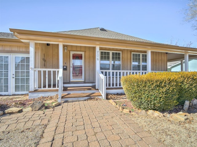 doorway to property with a porch