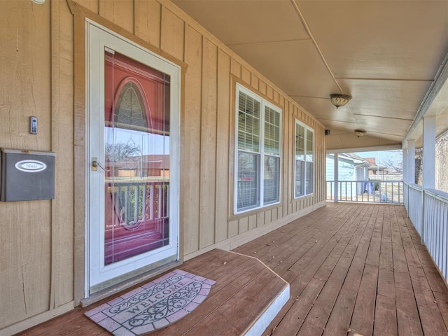 entrance to property with covered porch