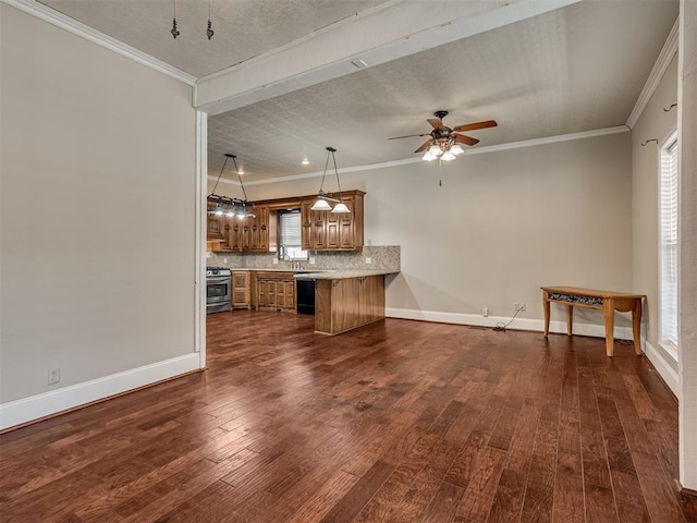 unfurnished living room featuring a textured ceiling, dark wood-type flooring, ornamental molding, and ceiling fan