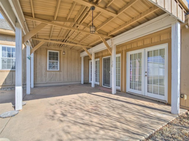 doorway to property with a patio area