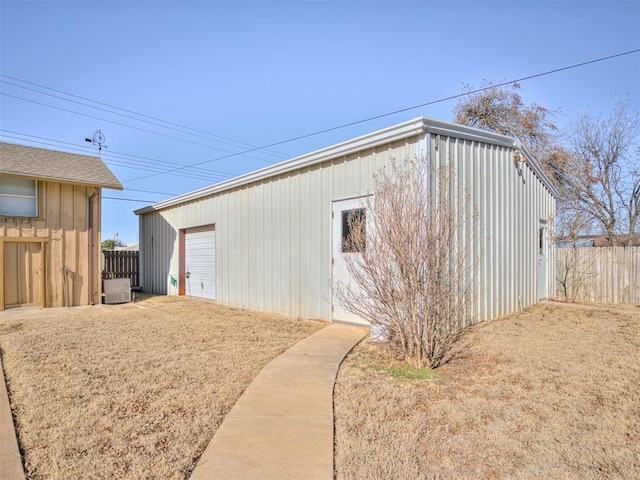 view of outbuilding featuring a garage