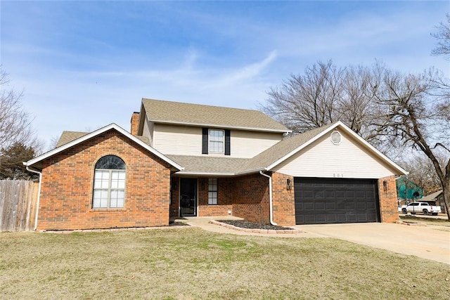 front of property with a front yard and a garage