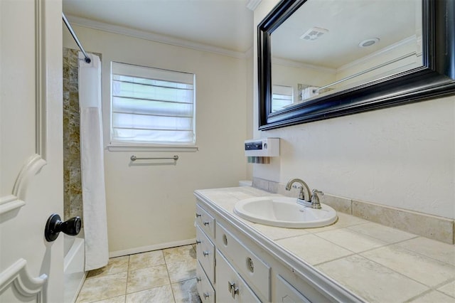 bathroom featuring shower / bath combination with curtain, ornamental molding, tile patterned flooring, and vanity