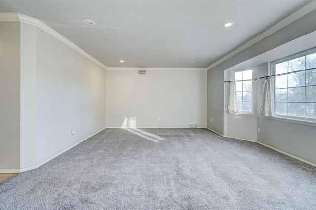 carpeted empty room with ornamental molding