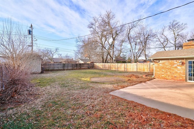 view of yard with a patio area