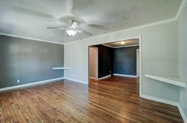 spare room featuring crown molding, ceiling fan, wood-type flooring, and a textured ceiling