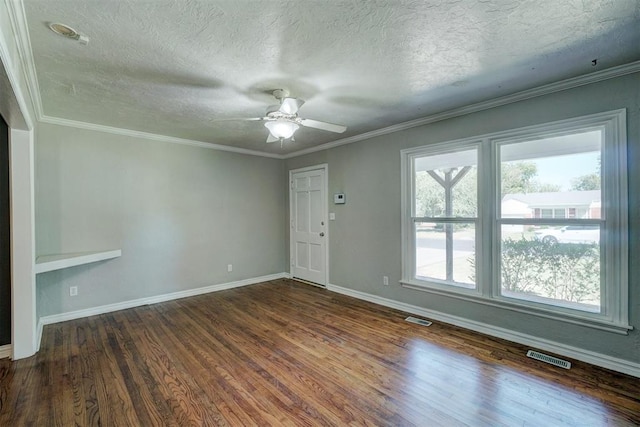 unfurnished room featuring ceiling fan, ornamental molding, dark hardwood / wood-style flooring, and a textured ceiling