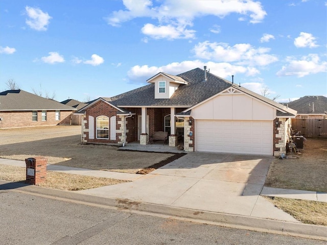 view of front of property featuring a garage