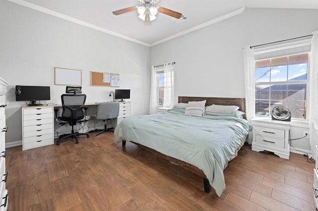 bedroom with multiple windows, hardwood / wood-style floors, and ceiling fan