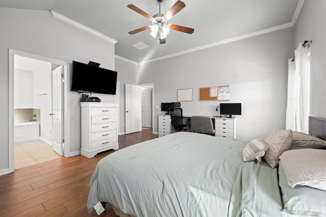 bedroom featuring ceiling fan, ornamental molding, connected bathroom, and lofted ceiling