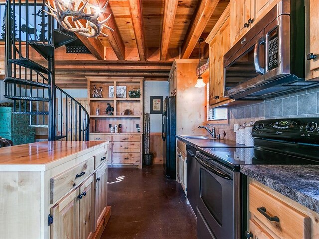 kitchen featuring light brown cabinetry, hanging light fixtures, sink, butcher block countertops, and stainless steel appliances