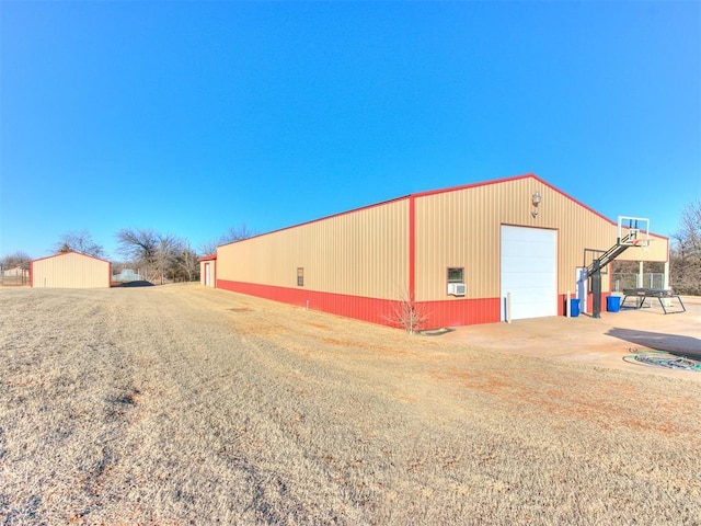 view of outbuilding featuring a garage